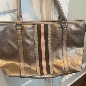 Gucci GG Gold Metallic Handbag with Pink & Brown Stripe.